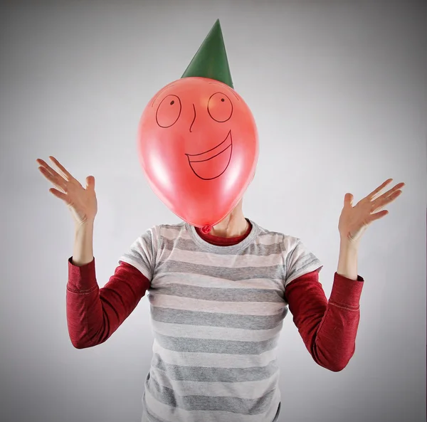 Person with balloon in front of him — Stock Photo, Image