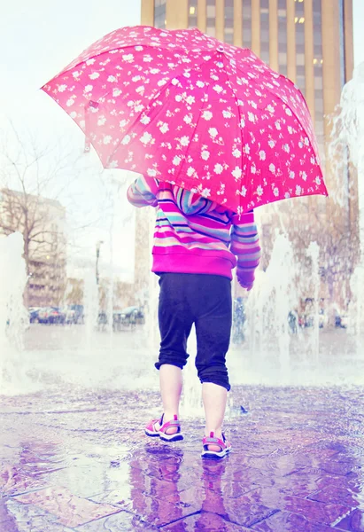 Girl with an umbrella — Stock Photo, Image