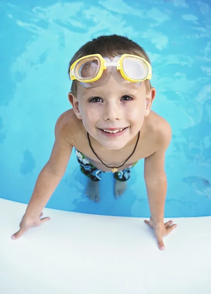 Young boy in pool — Stock Photo, Image