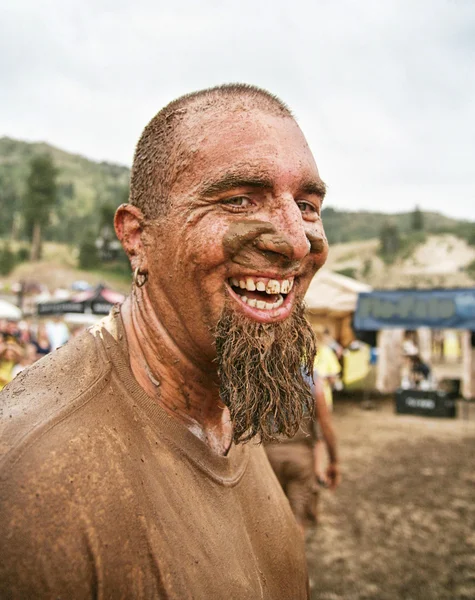 Man with muddy face — Stock Photo, Image