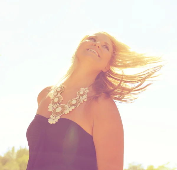 Girl flipping her hair — Stock Photo, Image