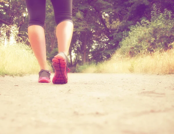 Athletic pair of legs jogging — Stock Photo, Image