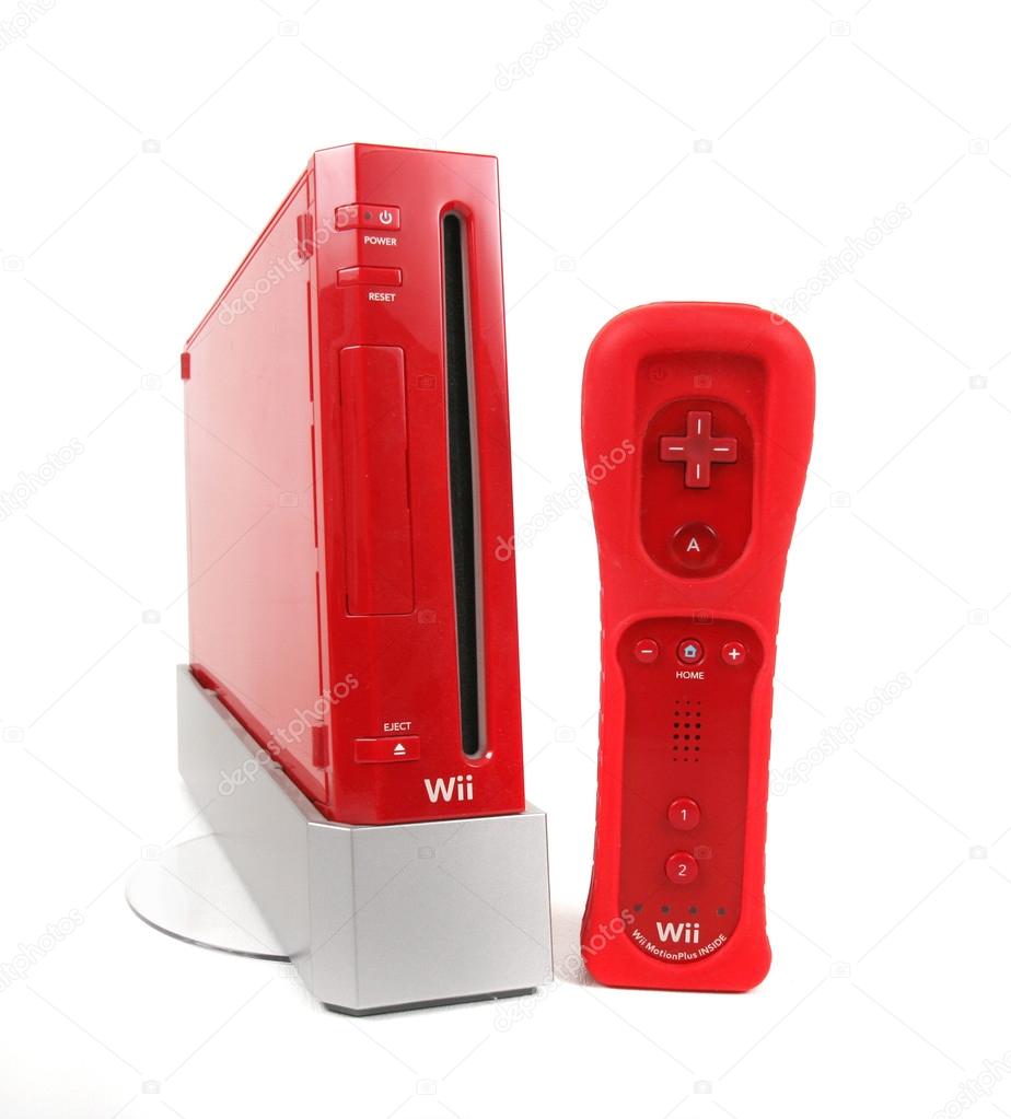 The Wii gaming system in special edition red color with a remote and manufacturer's box.