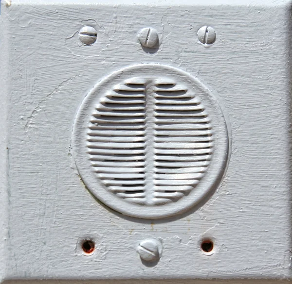 Close-up of building intercom on a wall — Stock Photo, Image