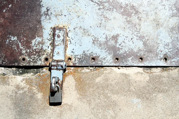 Rusty bolts on grunge metal background — Stock Photo, Image