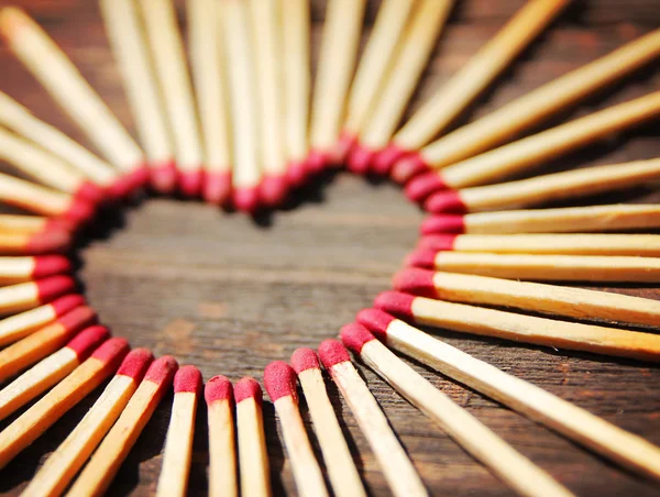 Matchsticks in shape of heart — Stock Photo, Image