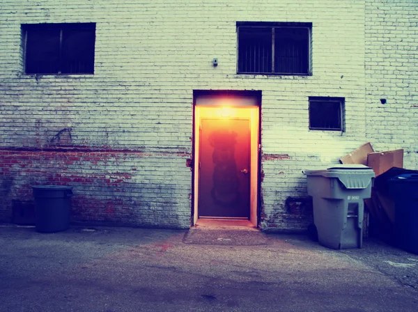 Building exterior with garbage container — Stock Photo, Image