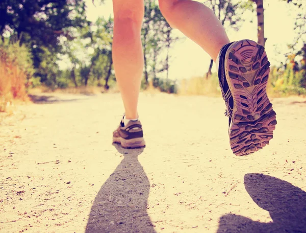 Athletic pair of legs running — Stock Photo, Image