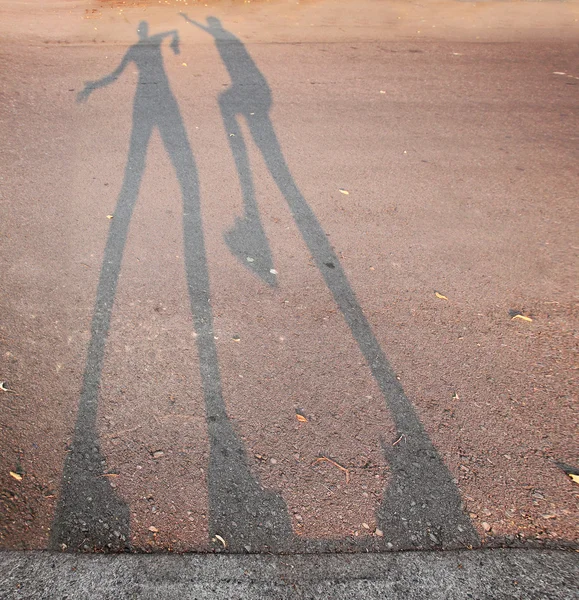 Sombra de duas pessoas — Fotografia de Stock