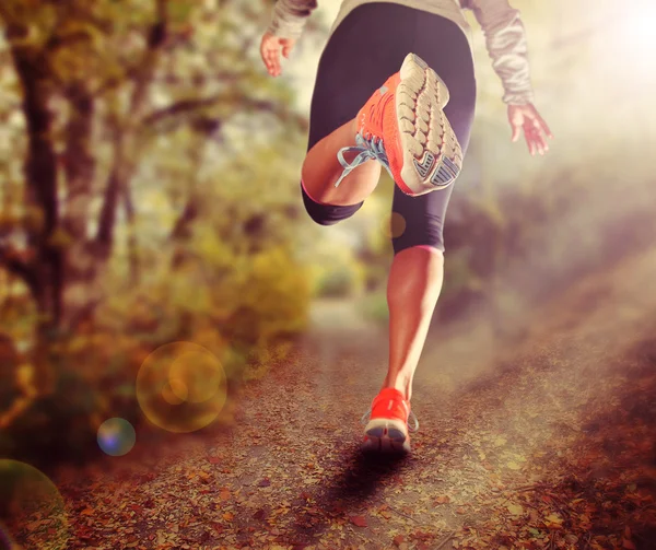 Athletisches Beinpaar beim Laufen — Stockfoto