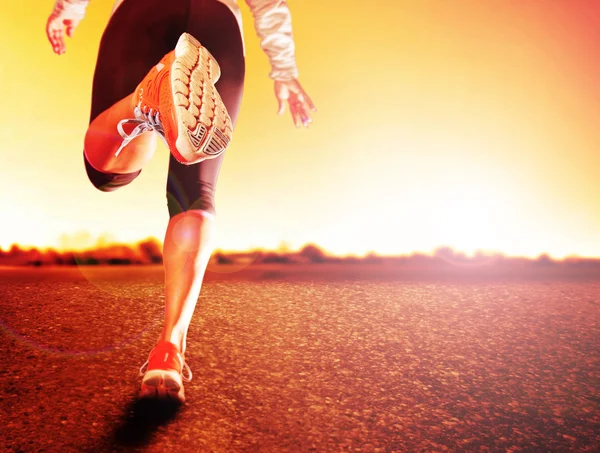 Athletic pair of legs running — Stock Photo, Image