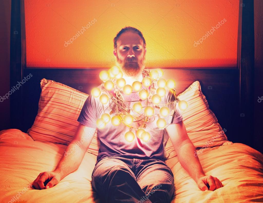 Man Draped In Christmas Lights Stock Photo C Graphicphoto 59131397