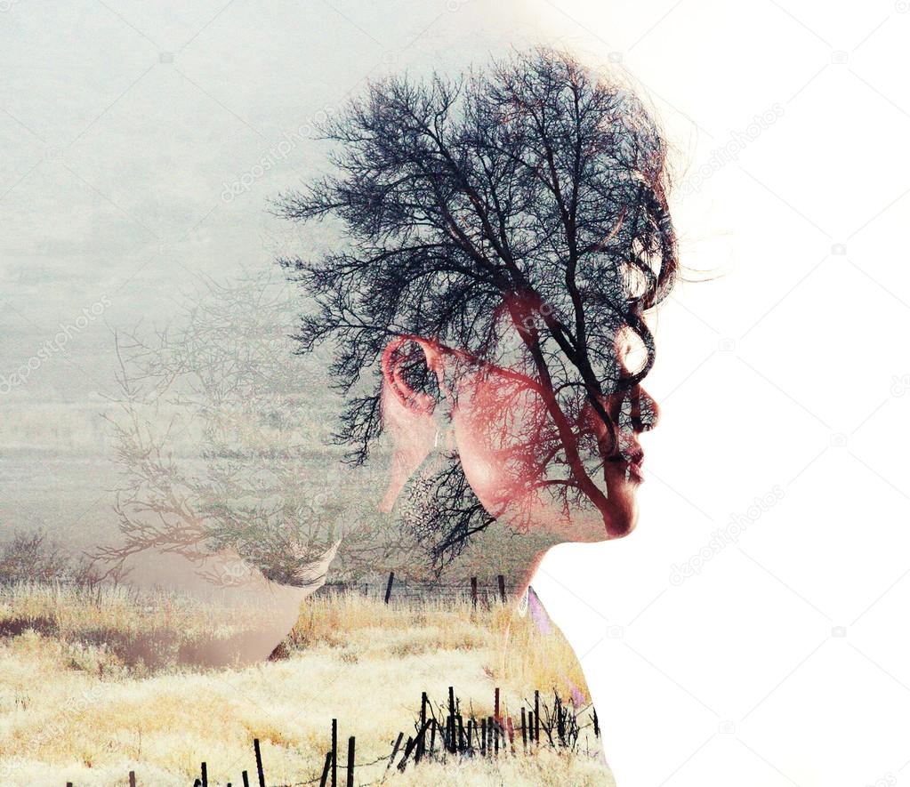 Double exposure with field trees and woman