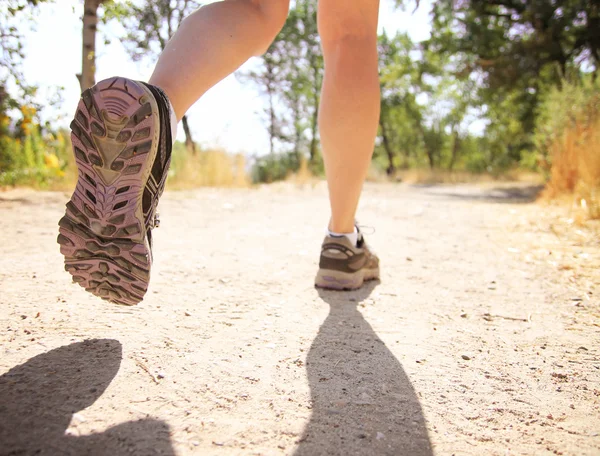 Athletic pair of legs running — Stock Photo, Image