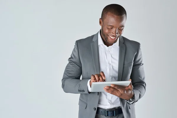 Businessman with touchscreen tablet device — Stock Photo, Image