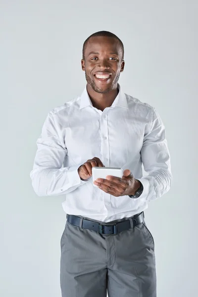 Geschäftsmann telefoniert mit seinem Handy — Stockfoto