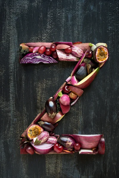 Abecední písmeno z purpurové zeleniny — Stock fotografie