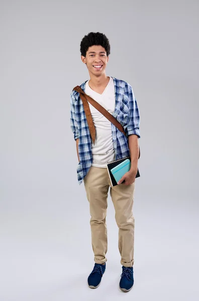 Estudiante con libros y bolsa — Foto de Stock