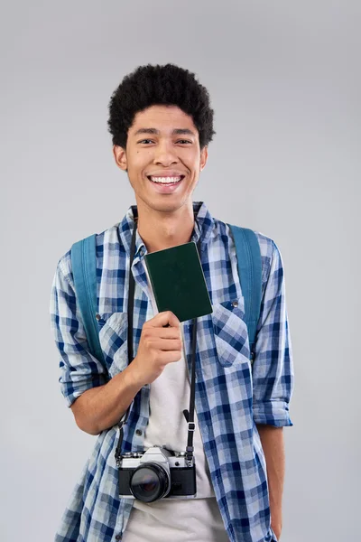 Mixed race man holding passport — Stock Photo, Image