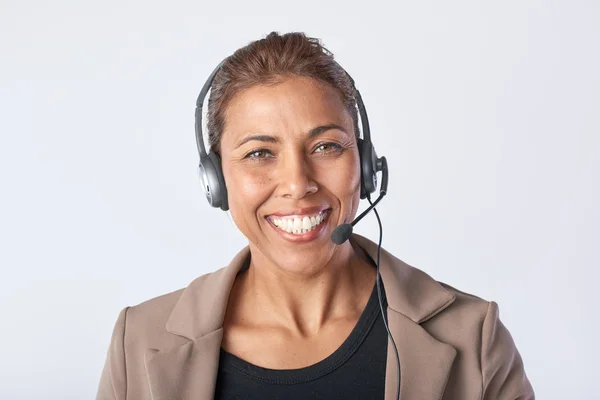 Mujer Consultoría con auriculares —  Fotos de Stock