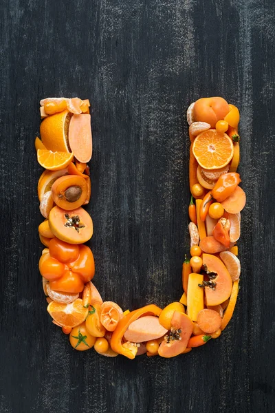 オレンジ色のアルファベットの文字 — ストック写真