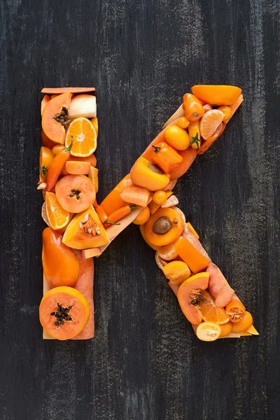Pomarańczowe litery — Zdjęcie stockowe