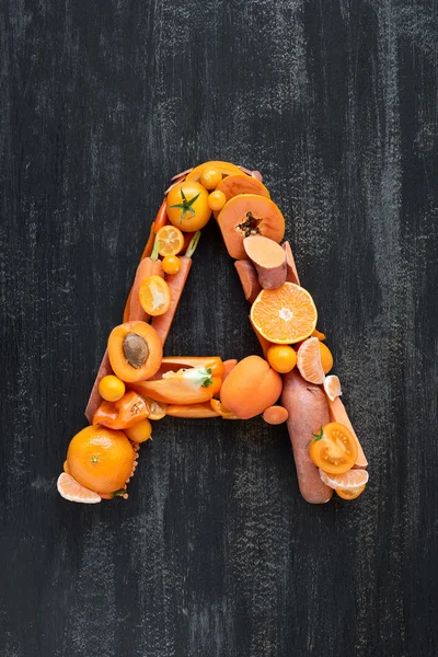 オレンジ色のアルファベットの文字 — ストック写真