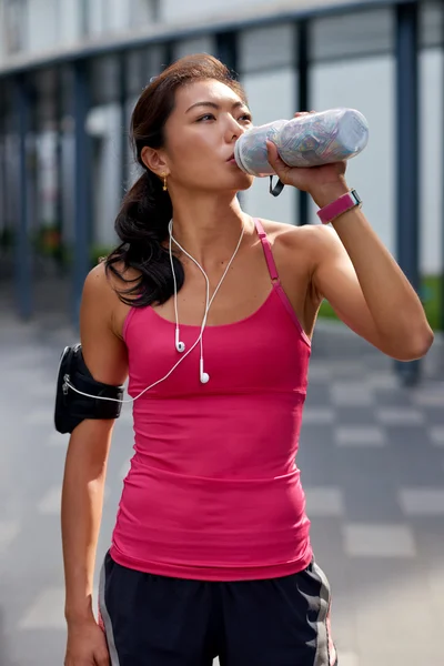 Thirsty woman water bottle — Stock Photo, Image