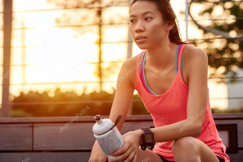 sporty woman water bottle