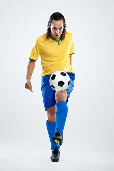 Football player in brasil kit — Stock Photo, Image