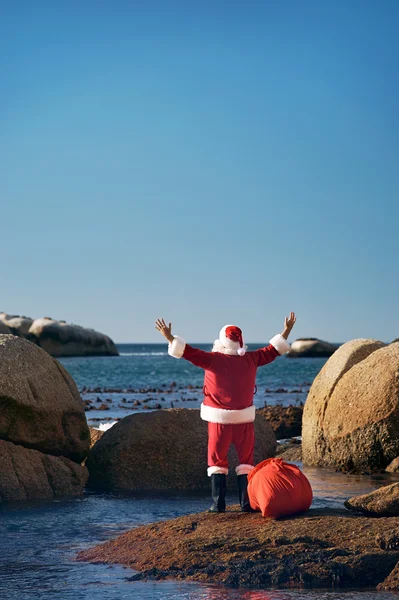 Santa Claus korzystających z powietrza mórz — Zdjęcie stockowe