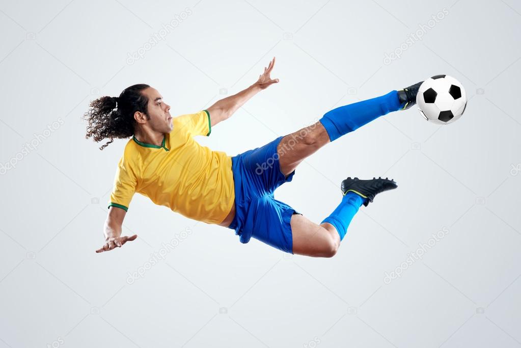 Soccer player kicking ball