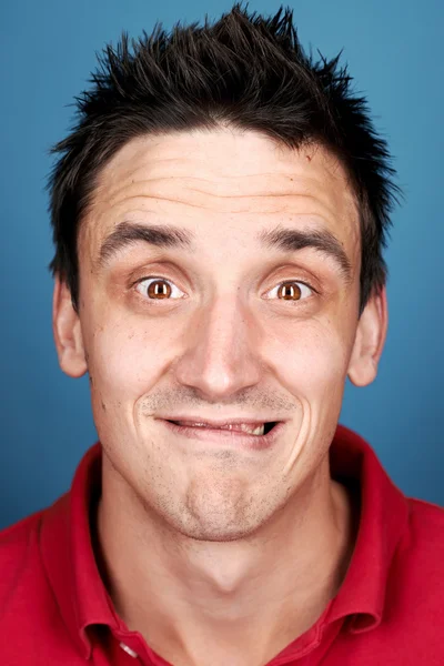 Man pulling silly expression — Stock Photo, Image
