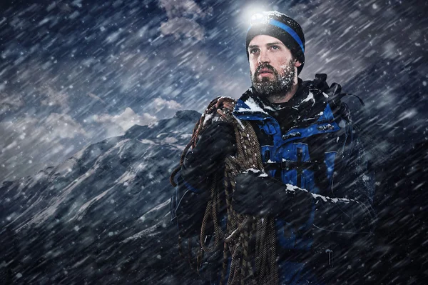 Mountain man in snow blizzard — Stock Photo, Image