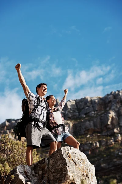 Couple with their arms raised — Stock Photo, Image