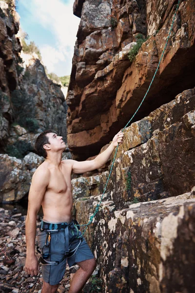 Man holding on his harness — Stock Photo, Image