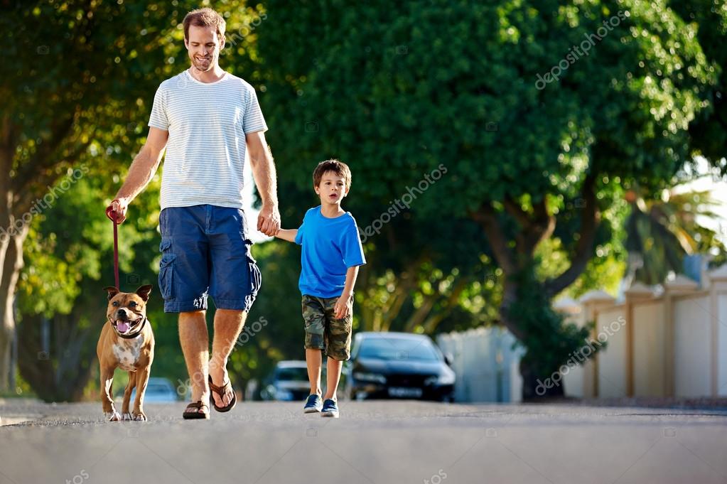 Padre caminando con perro e hijo: fotografía de stock © Daxiao ...