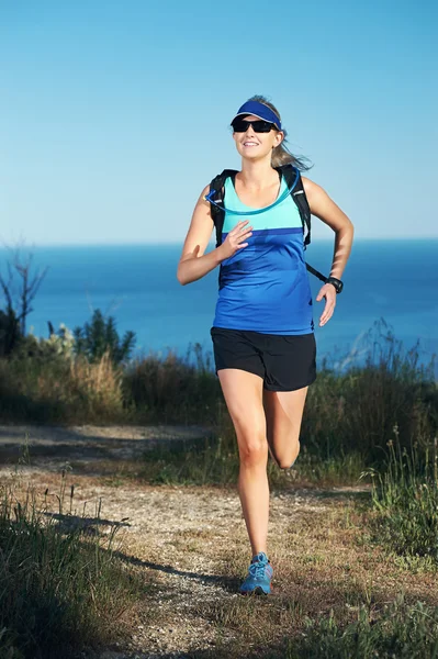 Runner vrouw joggen — Stockfoto