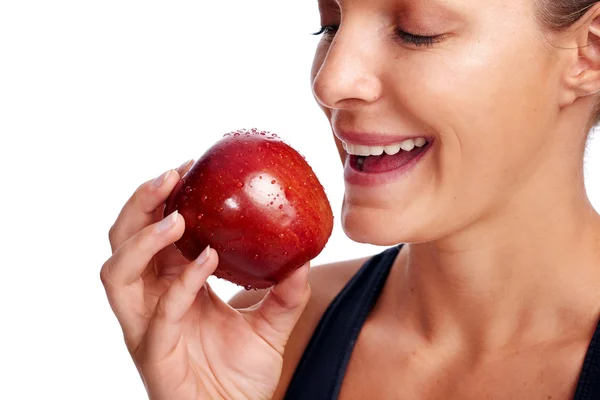 Kobieta jedzenie pyszne czerwone jabłko — Zdjęcie stockowe