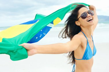 Latin kadın Brasil bayrak ile