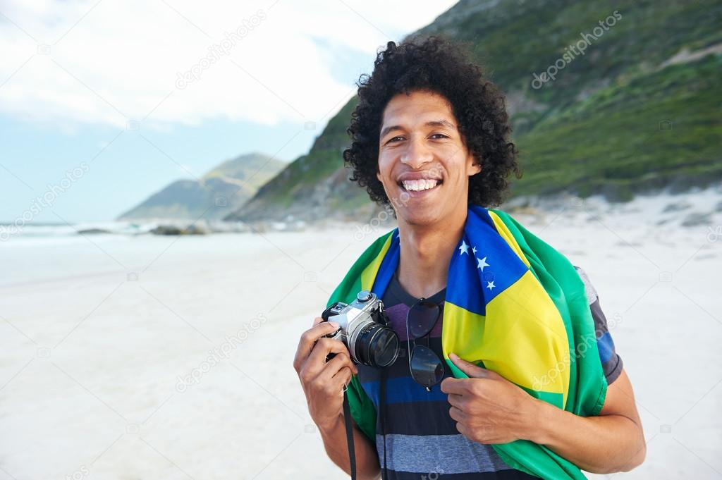 Brazil soccer fan tourist at beach