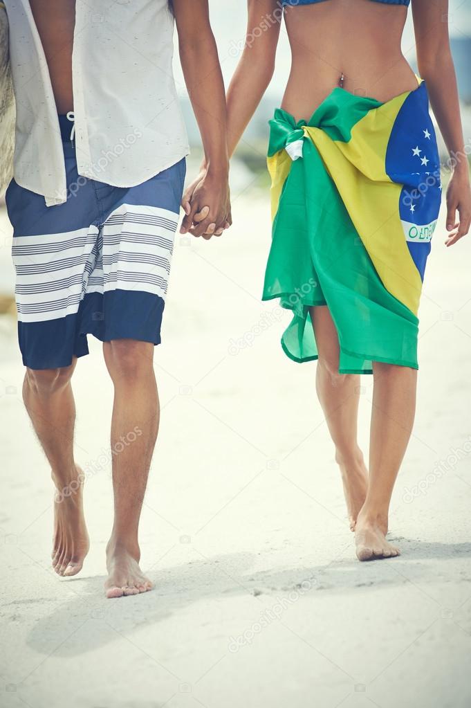 Couple in love walking on beach