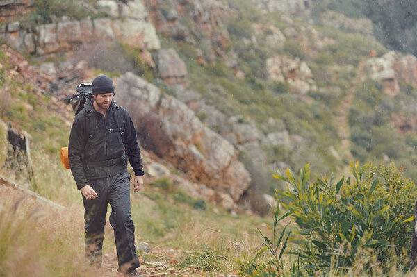 Man hiking wilderness mountain Stock Image