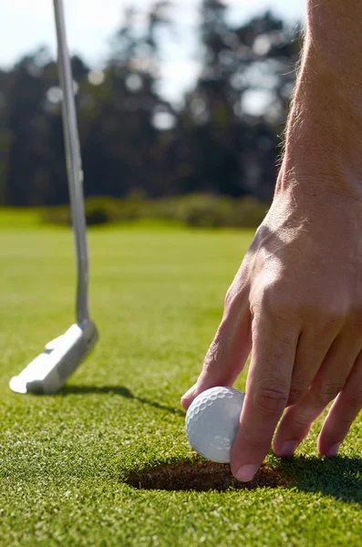 Hole golf man — Stock Photo, Image