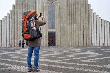 backpacker woman in front of Cathedral