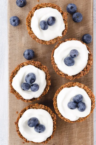 Blueberry tarts overhead — Stock Photo, Image