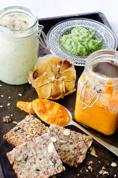 Dips and spread with seeded bread as a snack — Stock Photo, Image