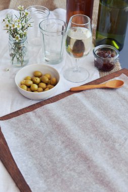 bottles of wine and olives