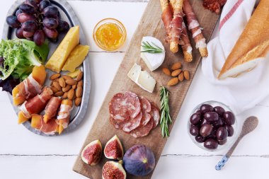 Overhead of charcuterie platter board