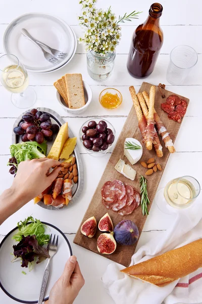 Charcuterie board on table — Stock Photo, Image